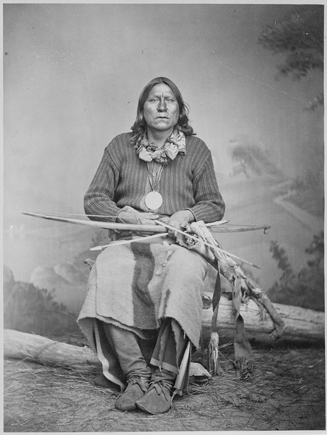 This image has an empty alt attribute; its file name is white_bear_sa-tan-ta_a_kiowa_chief_full-length_seated_holding_bow_and_arrows_1869_-_1874_-_nara_-_518901.jpg